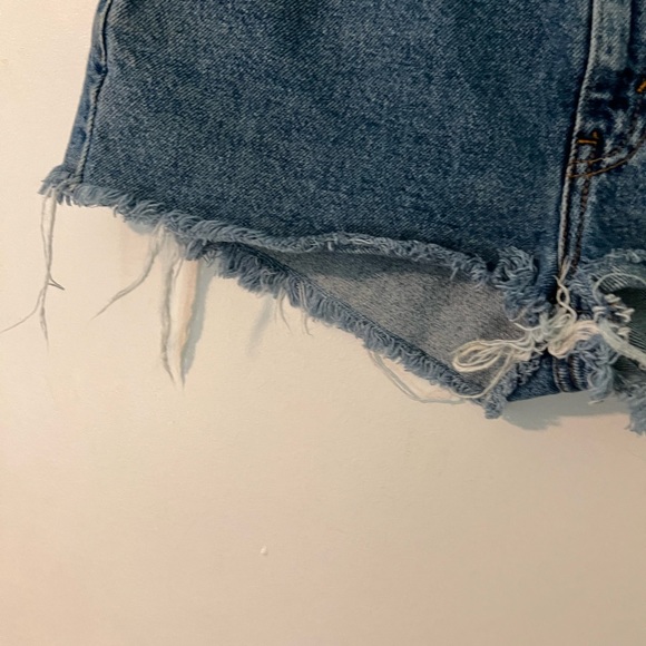 Vintage Levi's Distressed Medium Wash Cut Off Shorts - Picture 8 of 10